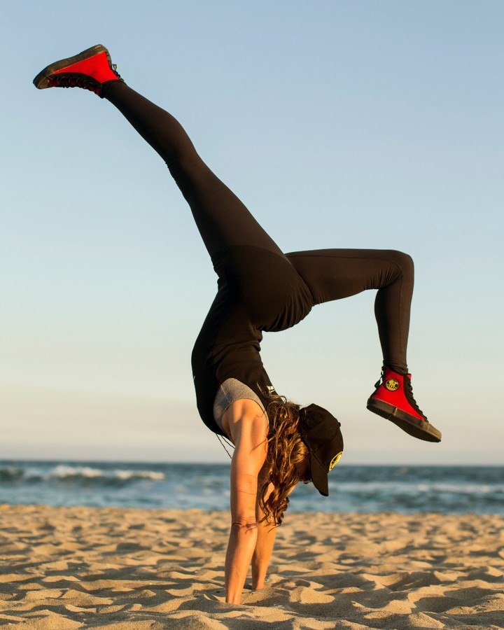 Poseidon One Shoe Beach Handstand
